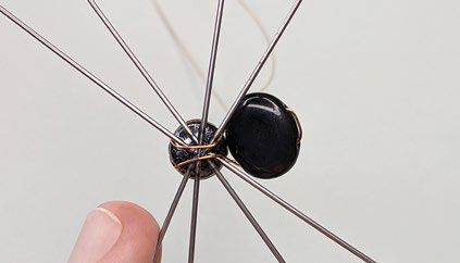 Underside of ornament frame, showing how to wrap wires from beaded component
